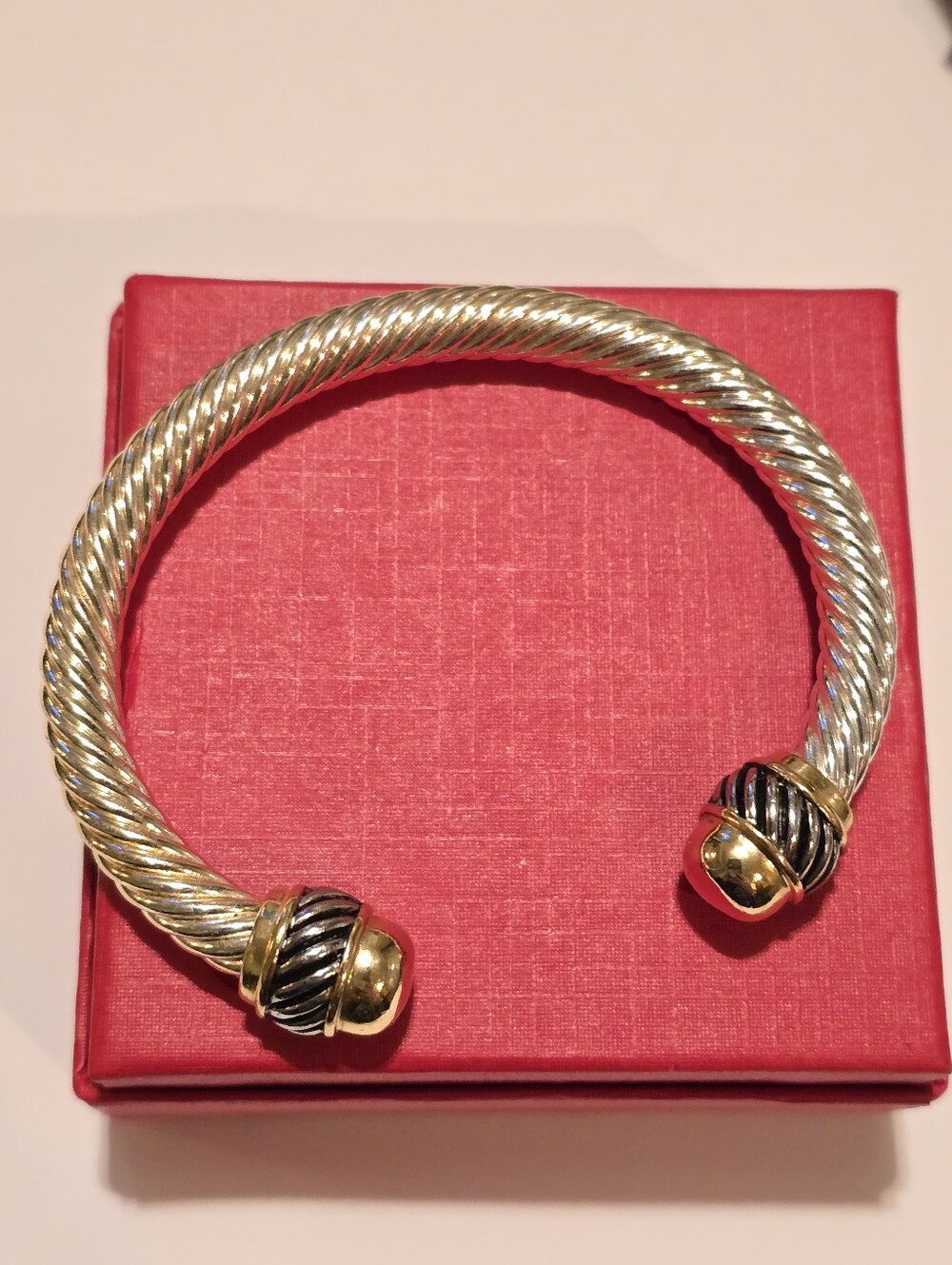 Cable cuff bracelet gold and silver tone